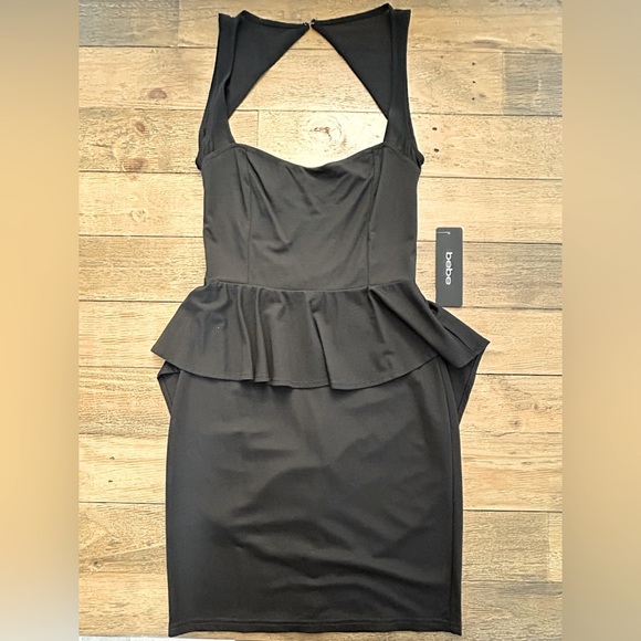 BEBE Black Peplum Bodycon Cocktail Mini Dress Open Back Sweetheart Neckline - Picture 5 of 13